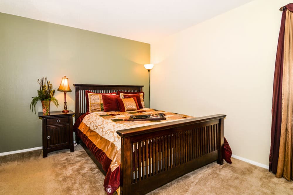 Bedroom with great lighting at Devonwood Apartment Homes in Charlotte, North Carolina