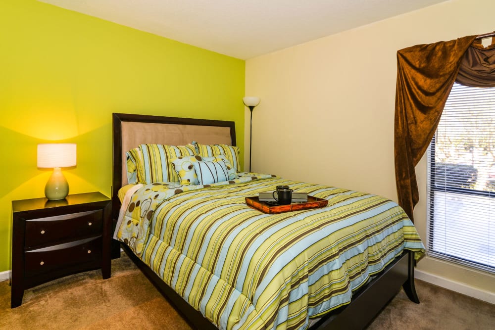 Bedroom with fun colors at Devonwood Apartment Homes in Charlotte, North Carolina