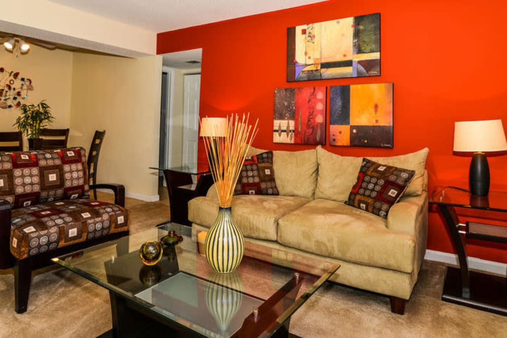 Living room with comfortable furniture at Devonwood Apartment Homes in Charlotte, North Carolina