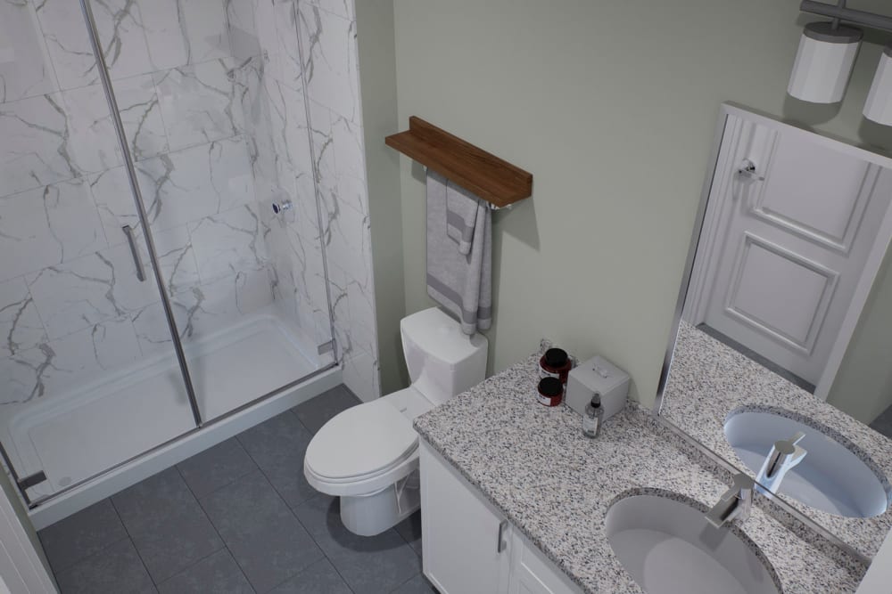 Unit bathroom with granite countertop at Amelia Westshore in Tampa, Florida