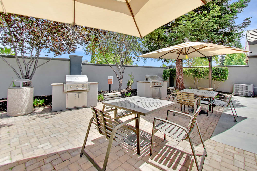 A grilling area by the pool at Avion Apartments in Rancho Cordova, California