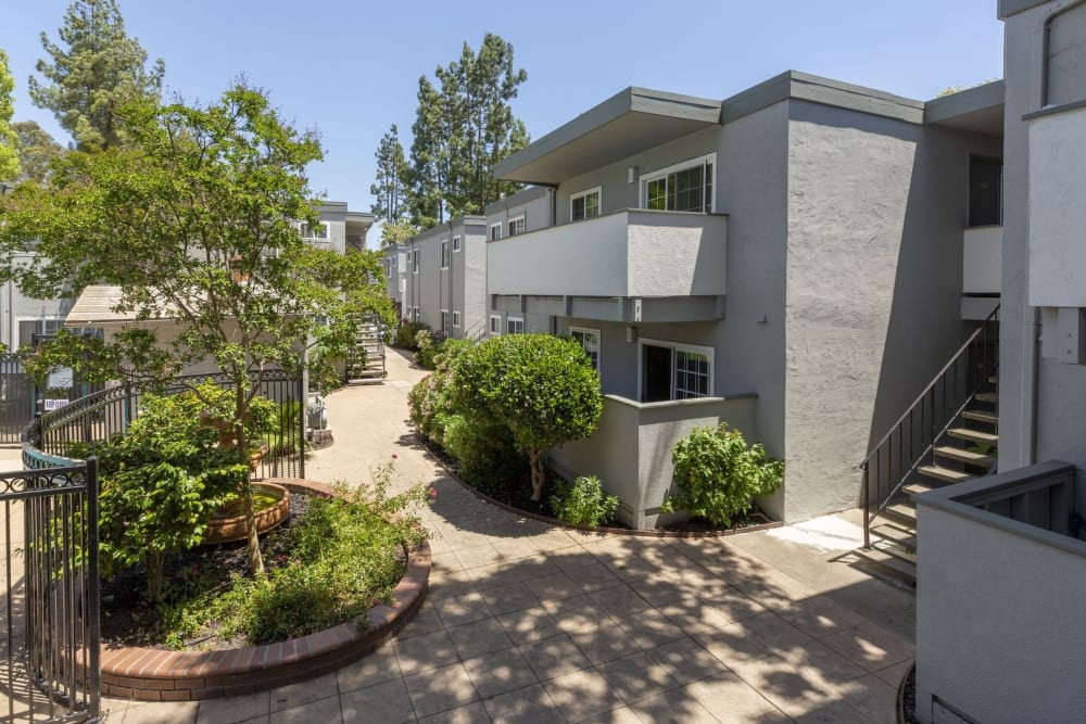 Walkways around the community at Adobe Lake Apartments in Concord, California