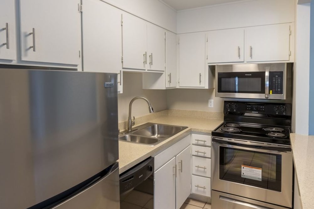 Kitchen with stainless-steel appliances at Catalina Crest Apartment Homes in Livermore, California