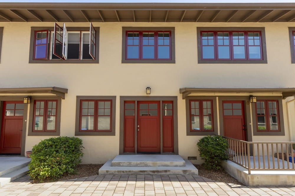 Building with red doors at Hawthorne Apartments in Palo Alto, California