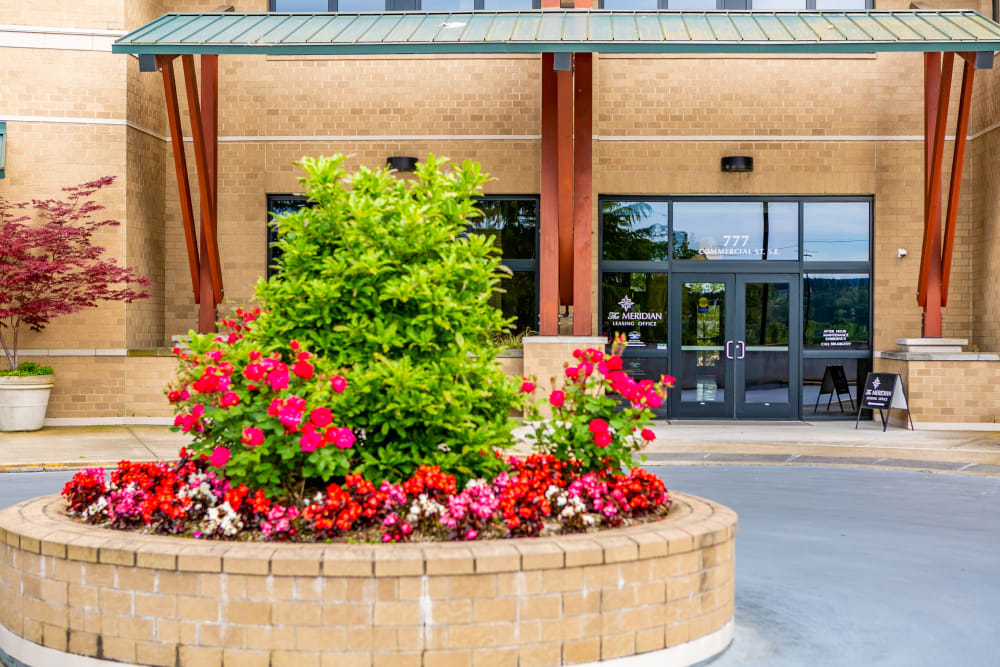 Beautiful flower garden outside entrance to The Meridian in Salem, Oregon