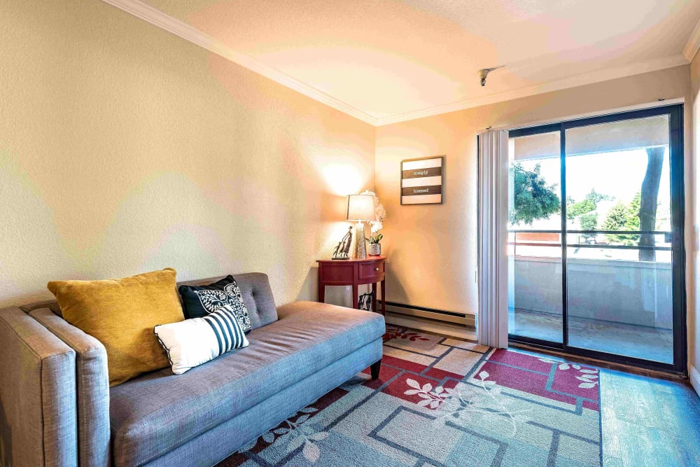 Living room in an apartment at Pacifica Senior Living San Leandro in San Leandro, California