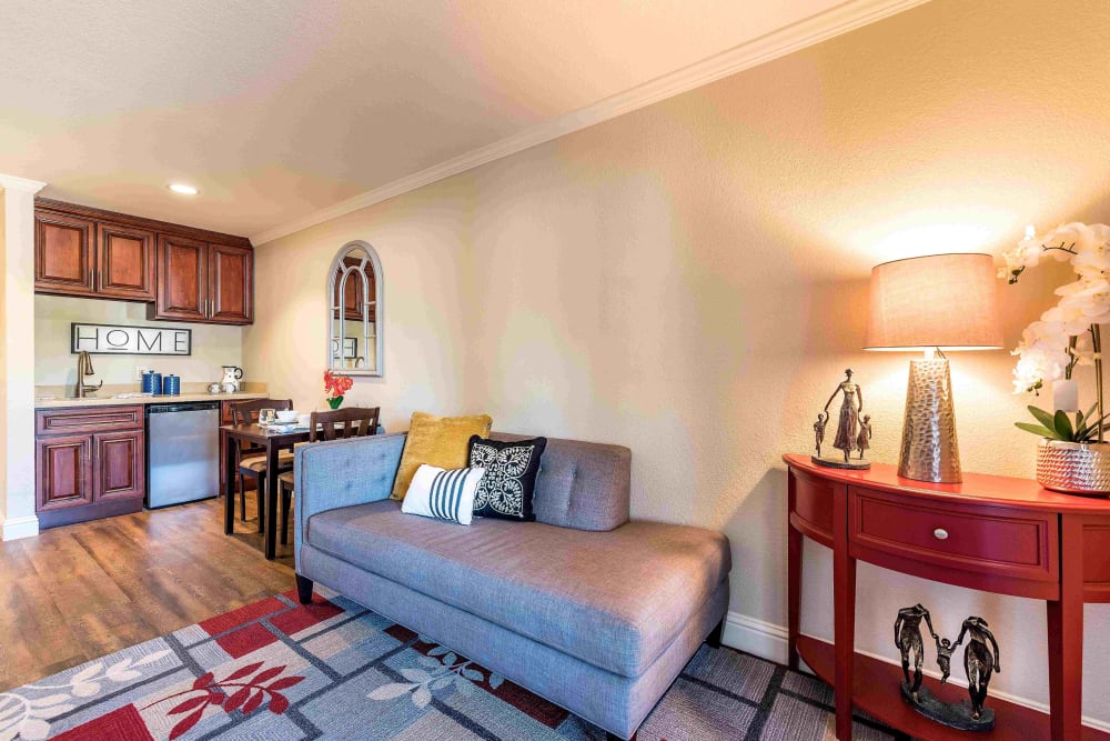Living room in an apartment at Pacifica Senior Living San Leandro in San Leandro, California