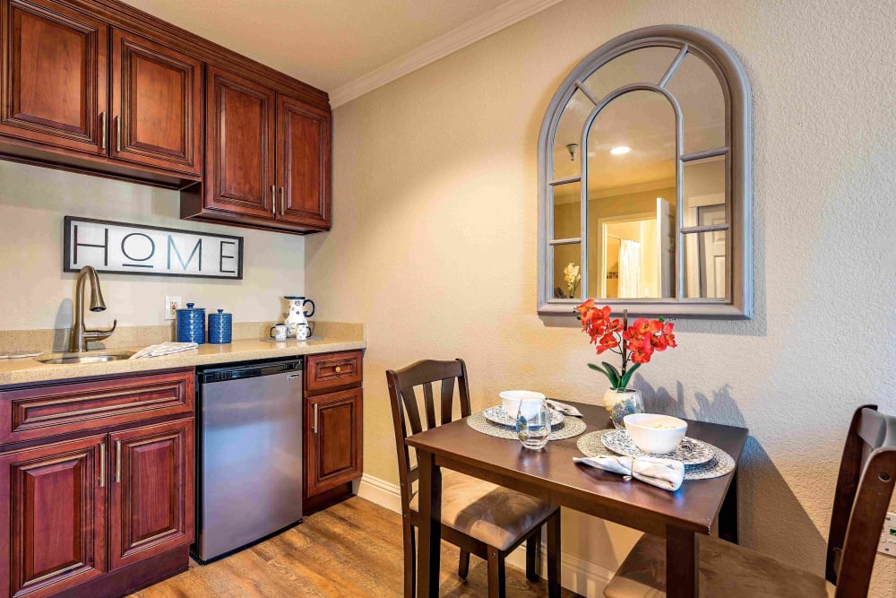 Dining area in an apartment at Pacifica Senior Living San Leandro in San Leandro, California