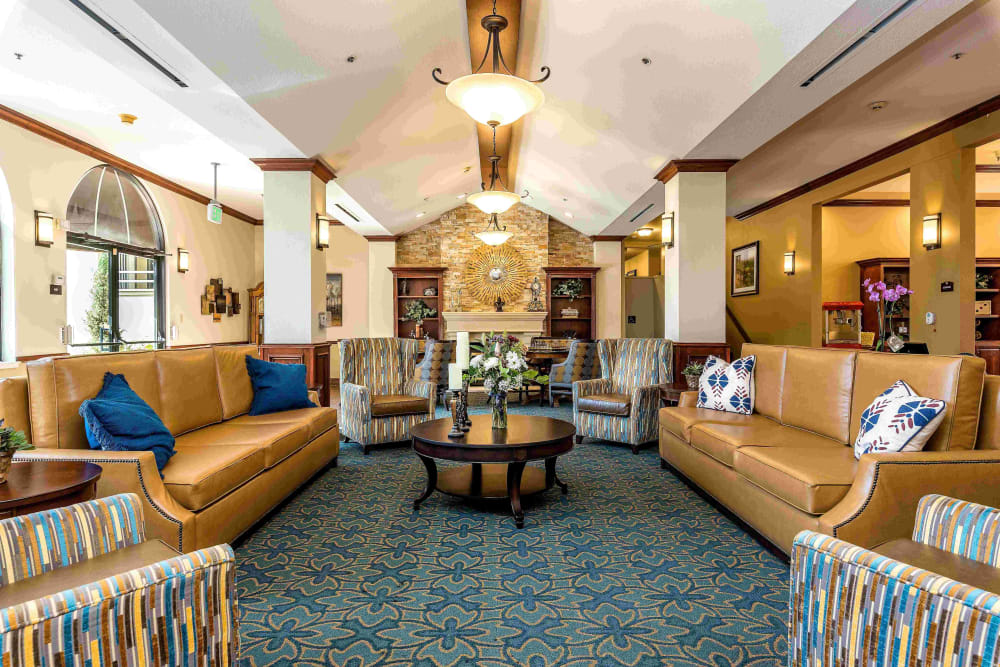 Spacious indoor lounge area at Pacifica Senior Living San Leandro in San Leandro, California
