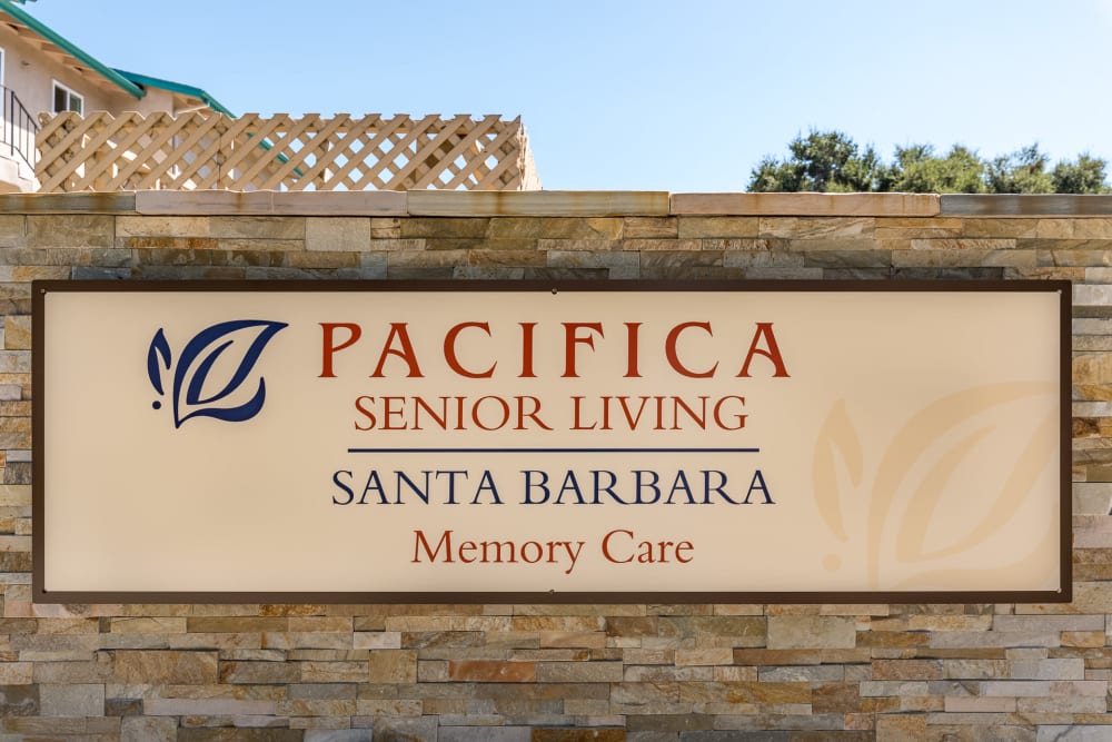 Front entrance with signage at Pacifica Senior Living Santa Barbara in Santa Barbara, California