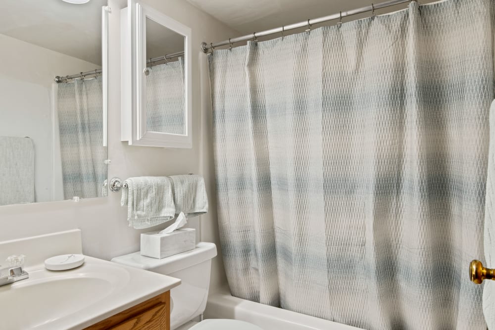 Bathroom with curtain at University Heights in Charlottesville, Virginia
