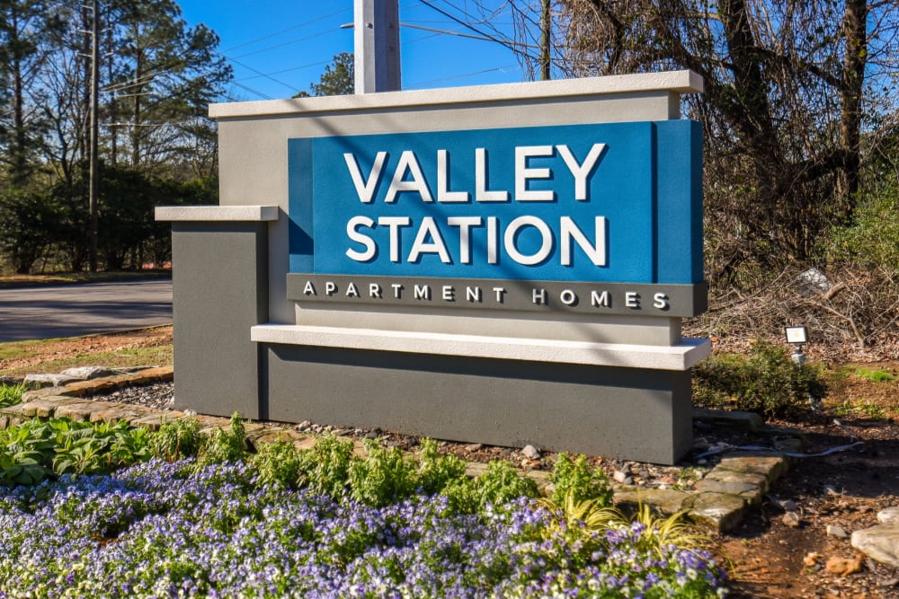 Modern welcome sign at Valley Station Apartment Homes in Birmingham, Alabama