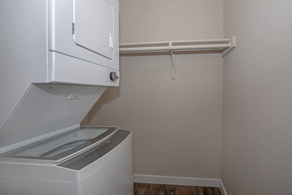Stacked washer and dryer in an apartment at Parkside at Castleton Square in Indianapolis, Indiana