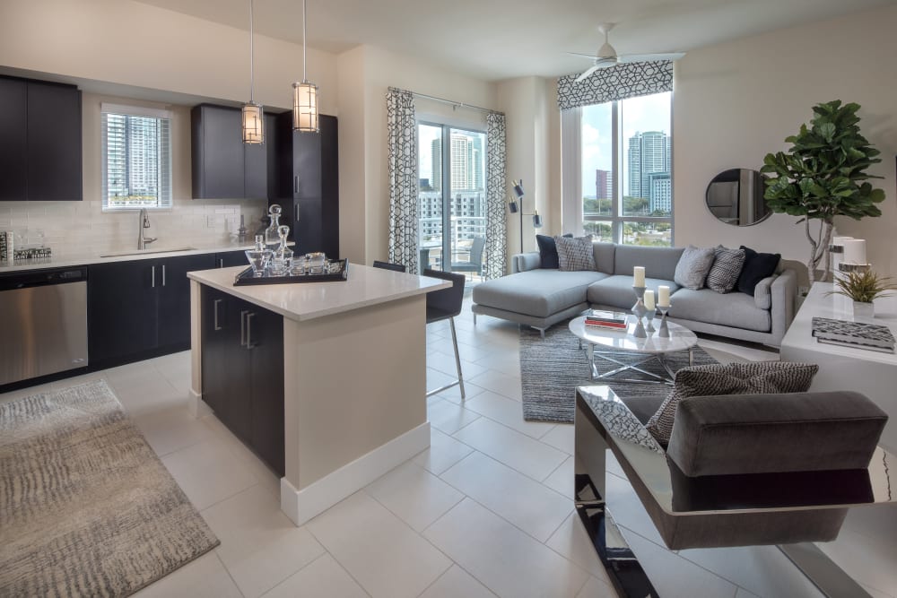 Spacious living room with wood flooring at Miro Brickell in Miami, Florida