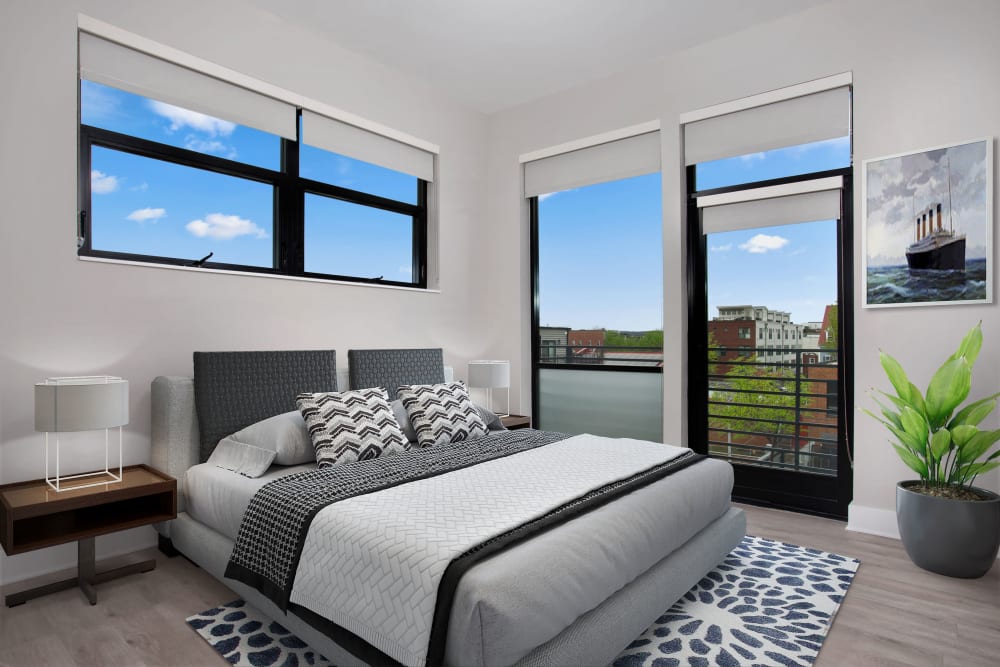 Bedroom with large windows and lots of natural light at Arcade Sunshine in Washington, District of Columbia