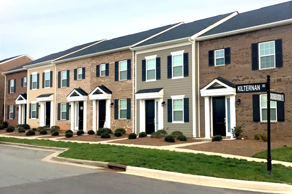 Exterior of the building at Charleston Row Townhomes in Pineville, North Carolina