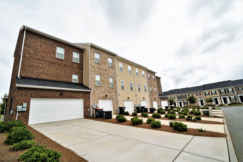 Townhomes with big garages at Charleston Row Townhomes in Pineville, North Carolina