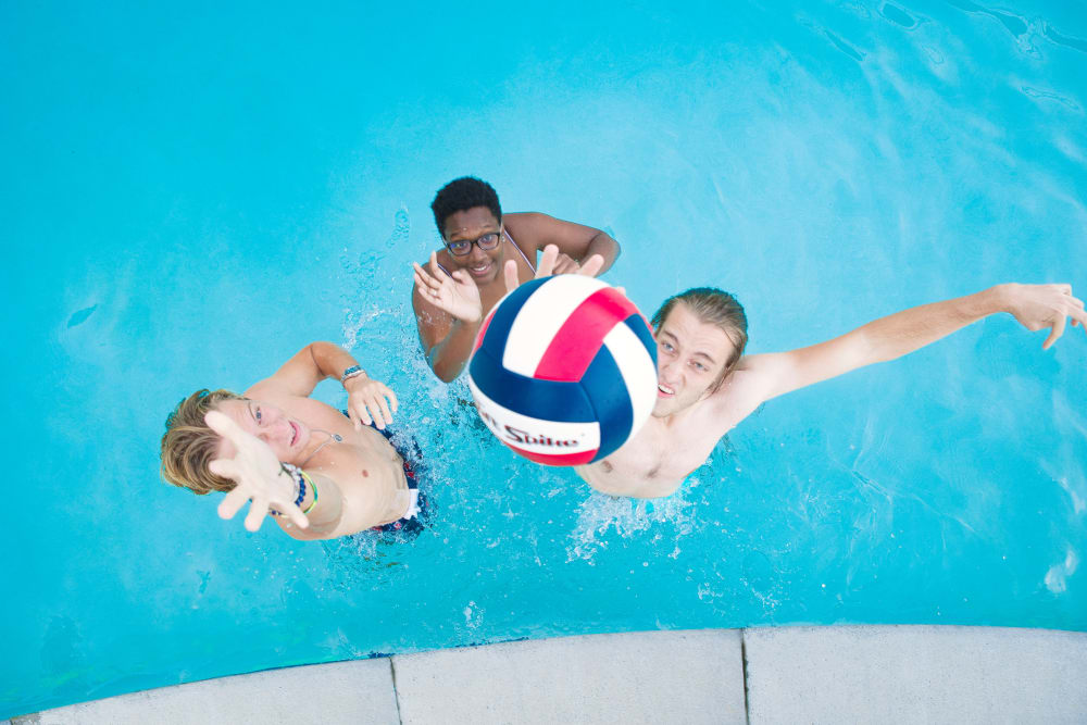 Residents playing in the swimming pool at Bellamy Dahlonega in Dahlonega, Georgia