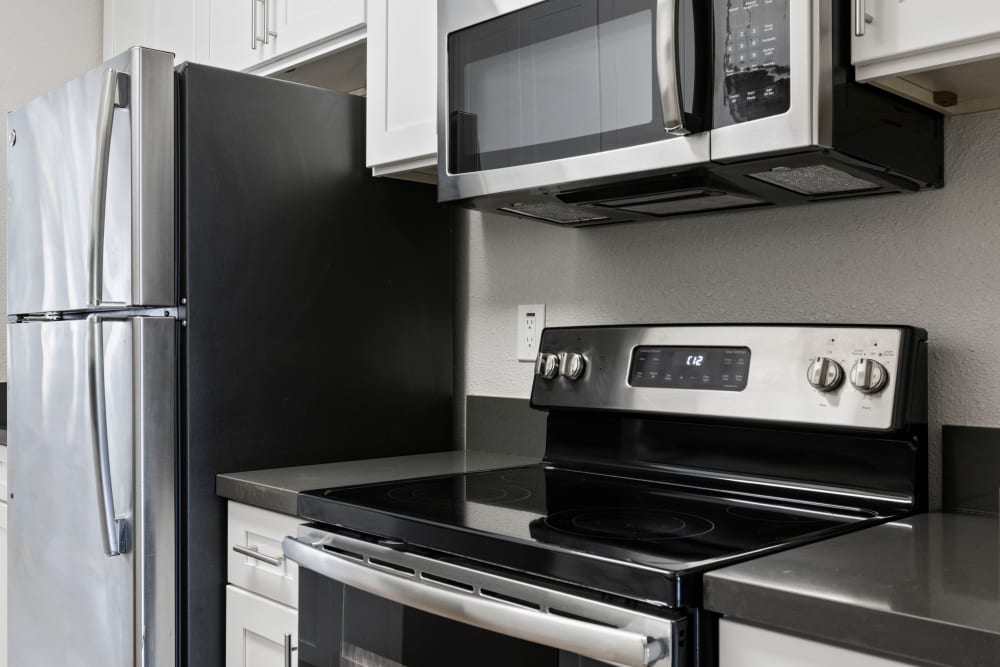 Spacious kitchen with stainless-steel appliances at Bidwell Park Fremont in Fremont, California