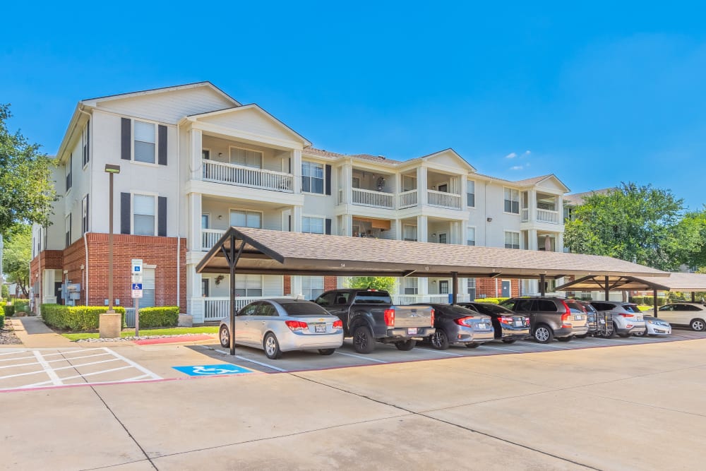 Covered parking and private balconies available at The Spring at Silverton in Fort Worth, Texas.