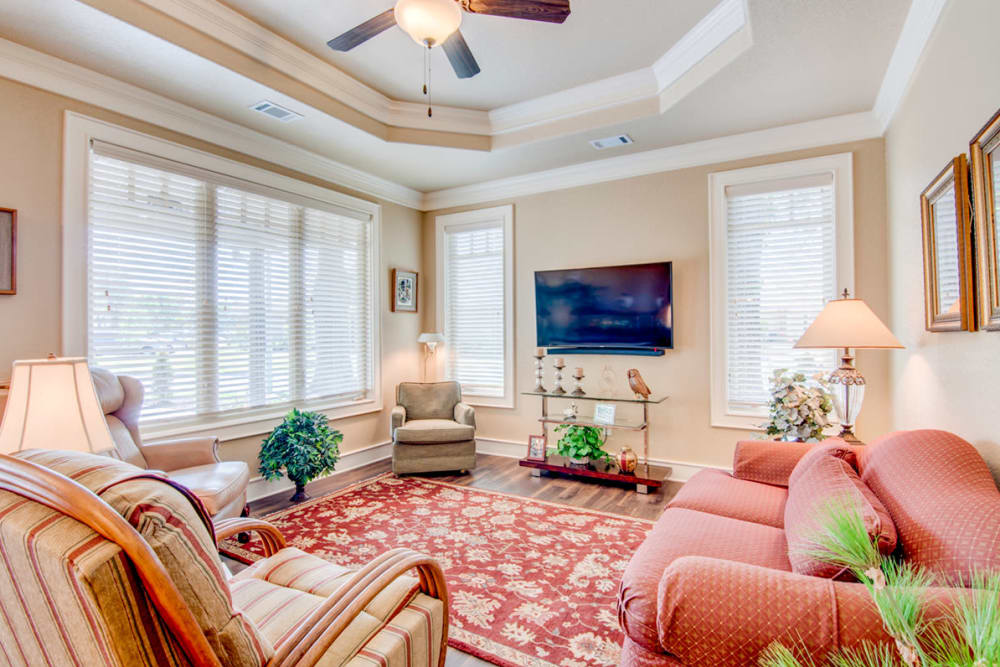 Wood flooring in a decorated cottage living room at Village on the Park Bentonville in Bentonville, Arkansas