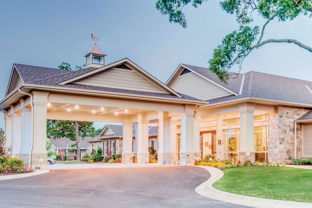 The driveway and main entrance at Village on the Park Bentonville in Bentonville, Arkansas