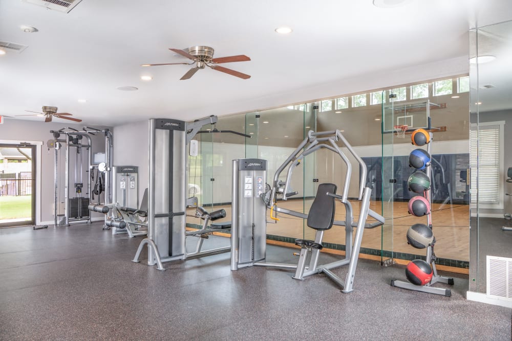 Our Apartments in Carrollton, Texas offer a Fitness Center and indoor basketball court
