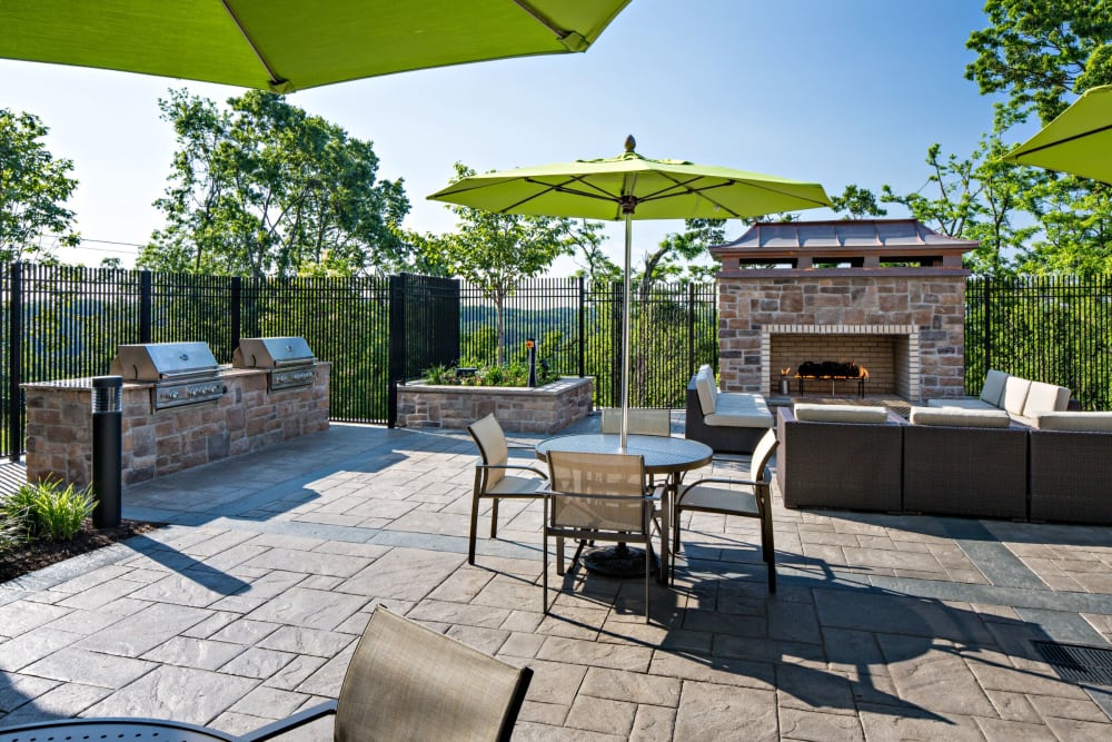Lounge seating with outdoor firepit at Vista at Town Green in Elmsford, New York