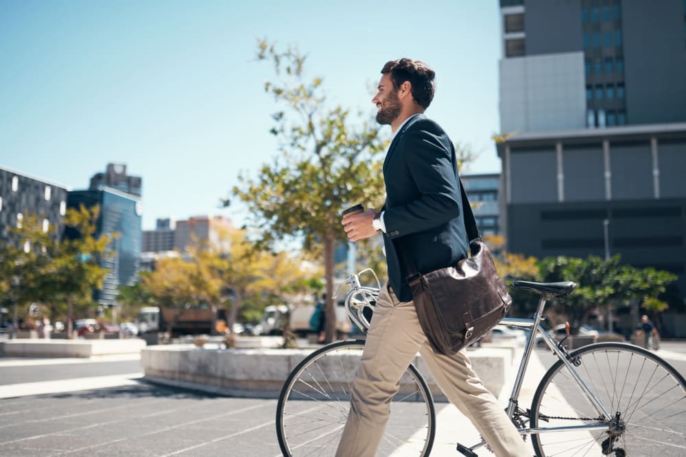 Resident walking his bike near Crescent at Shadeland in Lexington, Kentucky