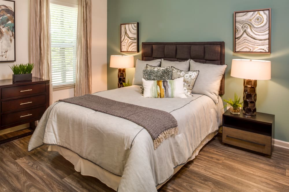 Model bedroom with wood flooring at 17 Barkley in Gaithersburg, Maryland