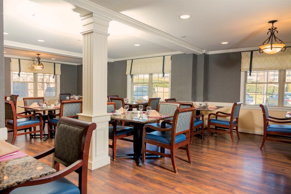 Spacious dining room at Pacifica Senior Living Victoria Court in Cranston, Rhode Island