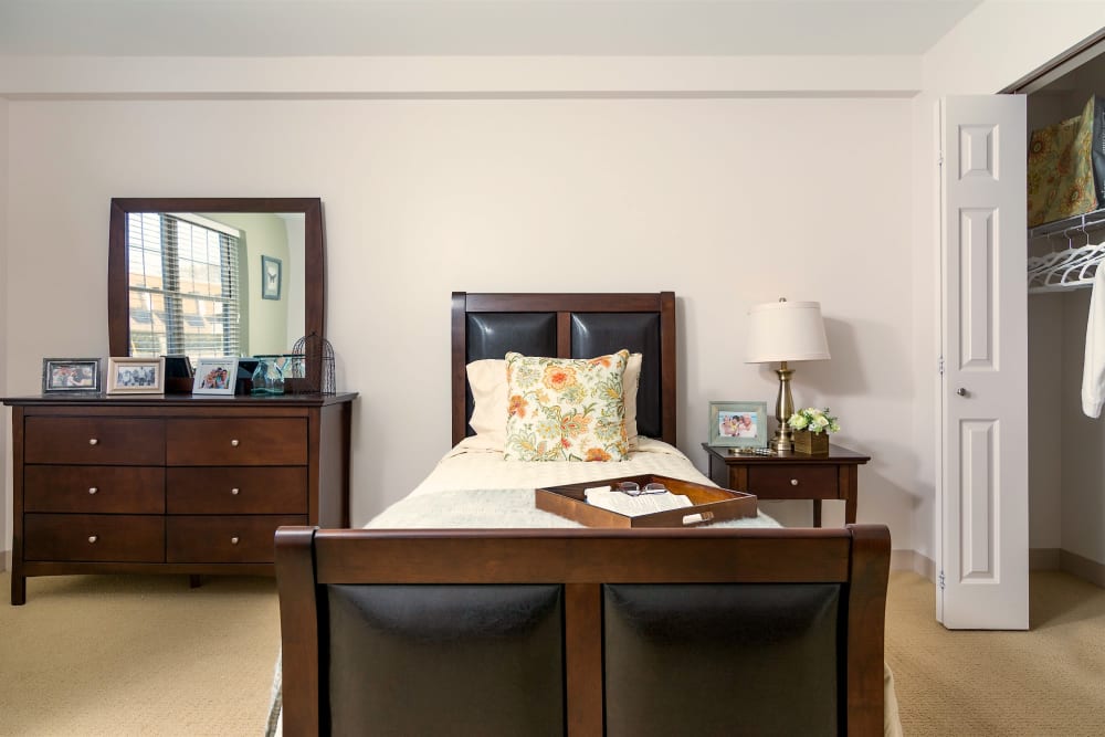 Resident bedroom at Pacifica Senior Living Victoria Court in Cranston, Rhode Island