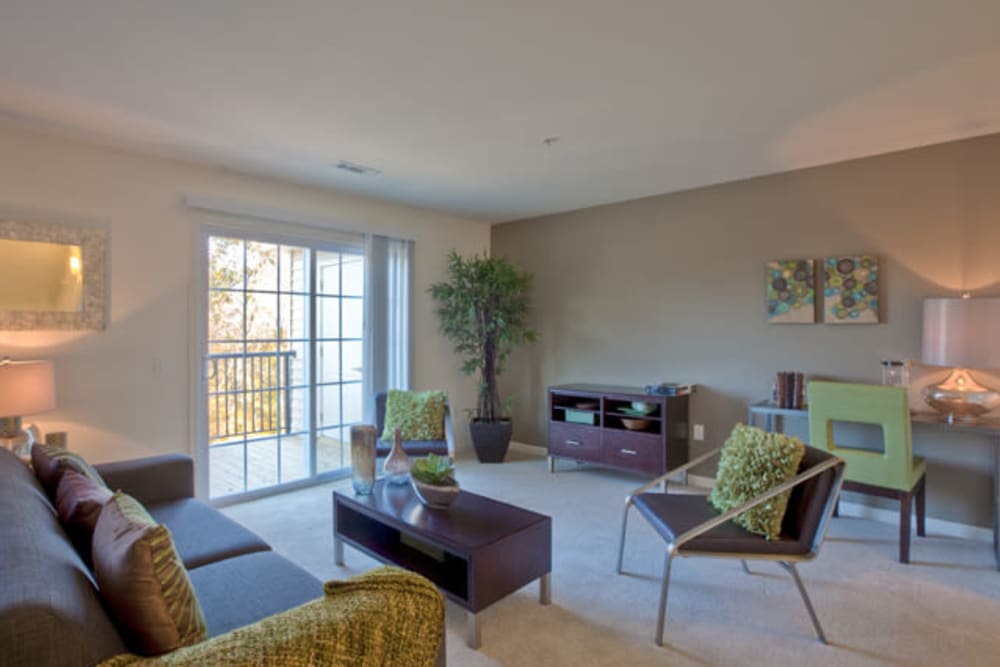 Well lit townhome living room at Vista at Town Green in Elmsford, New York