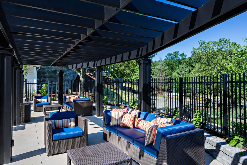 Poolside lounge area at Vista at Town Green in Elmsford, New York