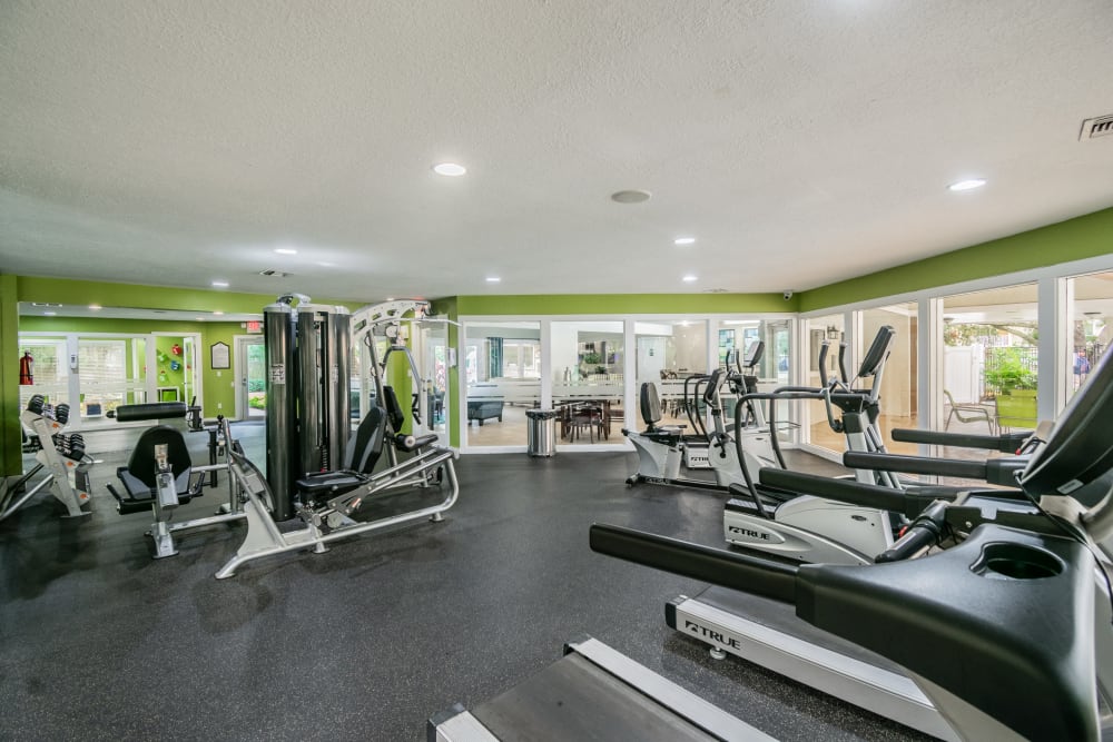 Well-equipped, spacious fitness center with cardio and strength training equipment at Coopers Pond in Tampa, Florida