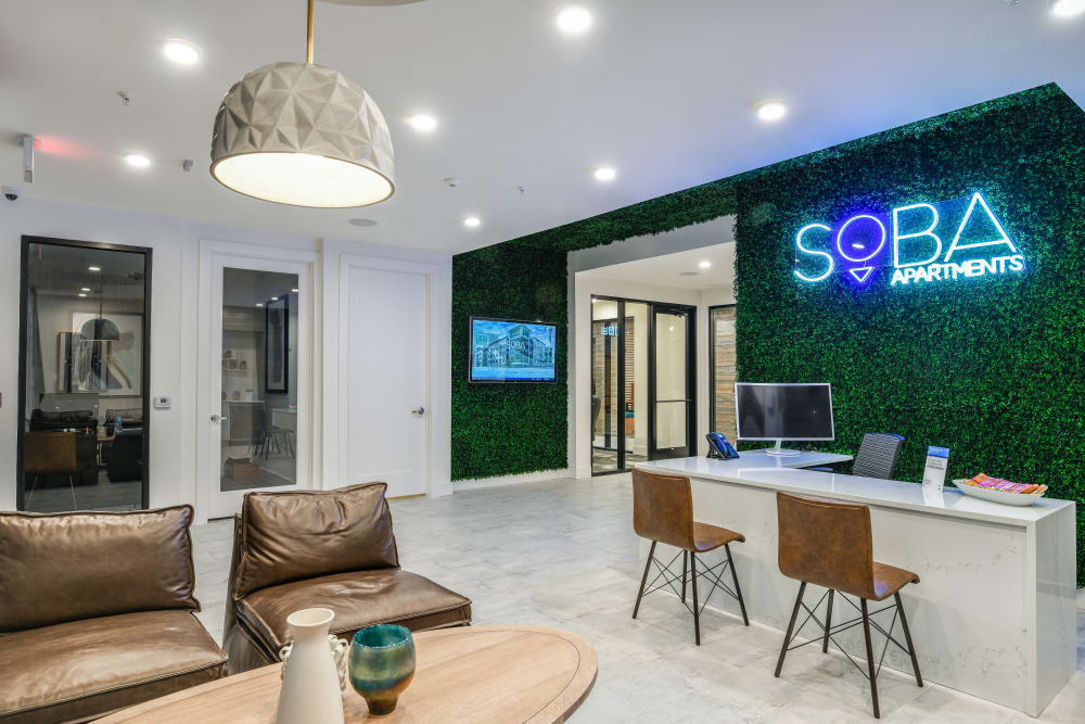 Lobby and lounge area at Soba Apartments in Jacksonville, Florida
