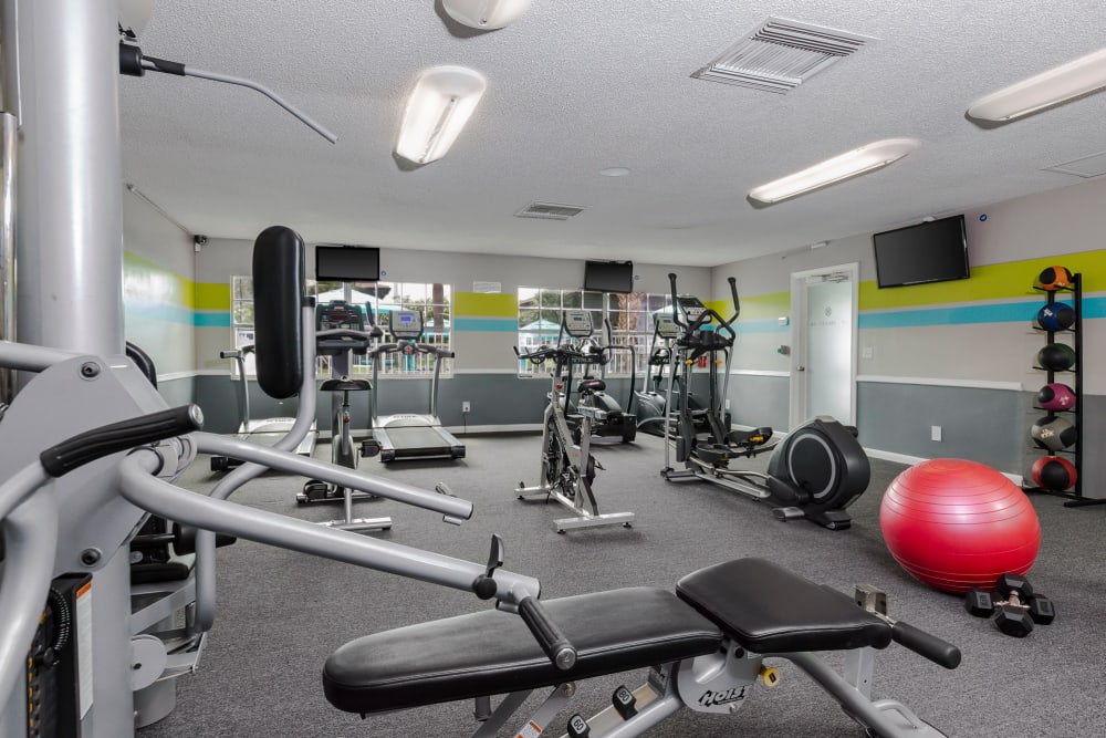 Fitness center with a variety of cardio and strength training equipment at Central Place at Winter Park in Winter Park, Florida