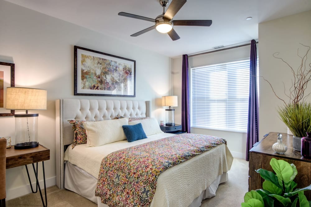 Master bedroom with a ceiling fan at The Residences at Annapolis Junction in Annapolis Junction, Maryland