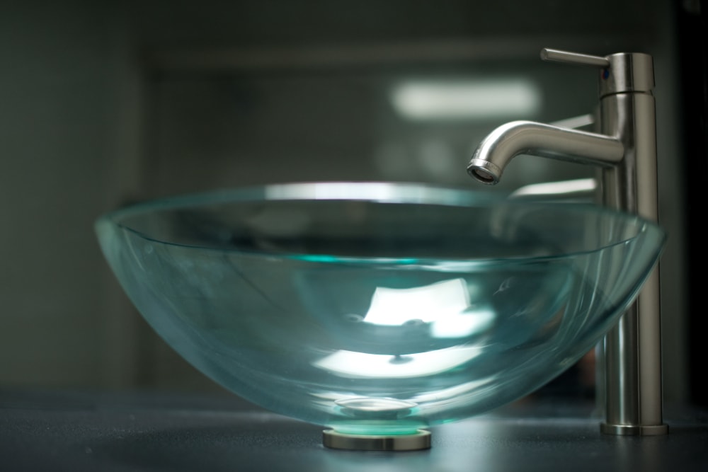 Close up of glass vessel sink at 3Fifty8 in Lexington, Kentucky