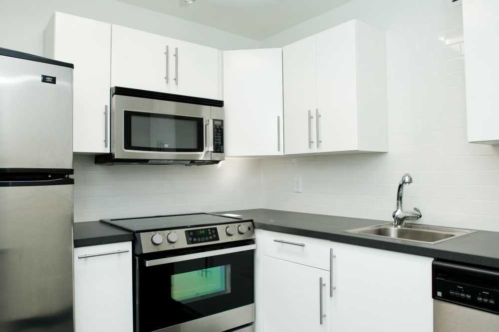 Kitchen with stainless-steel appliances at 3Fifty8 in Lexington, Kentucky