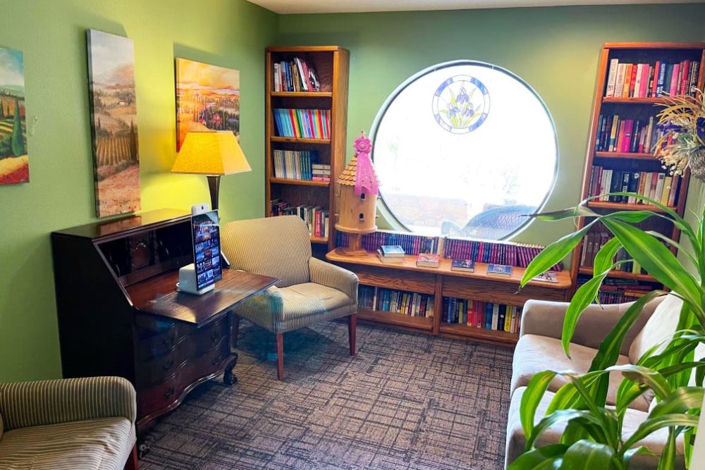 Reading nook with a piano at Desert Peaks Assisted Living and Memory Care in Las Cruces, New Mexico