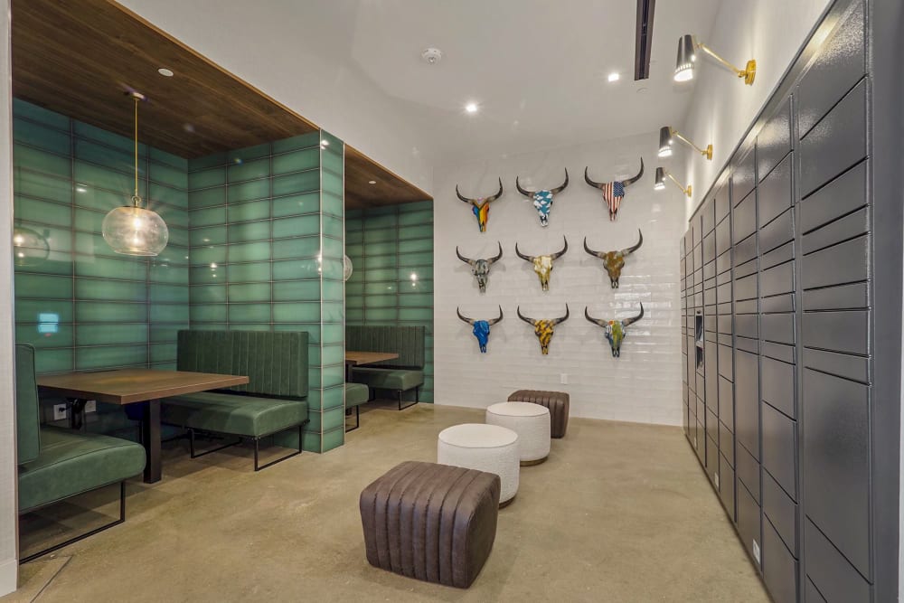 Lobby work booths and Amazon locker at Big Sky Flats in Washington, District of Columbia
