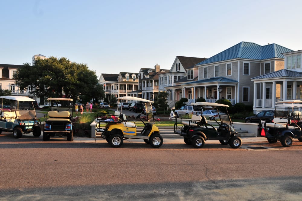 A line of golf carts at Village Square Apartments in Norfolk, Virginia