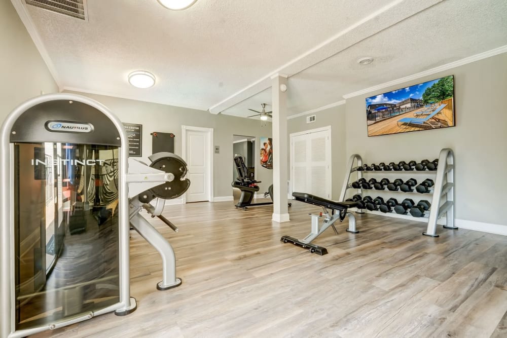 Well-equipped fitness center with cardio equipment at Hickory Creek Apartments & Townhomes in Nashville, Tennessee