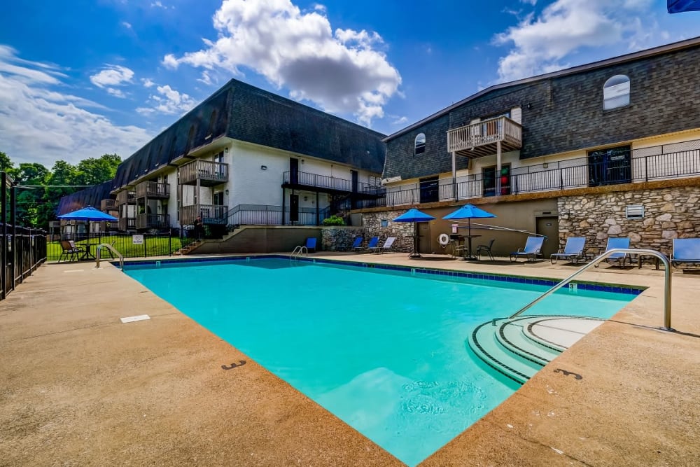 Beautiful blue sky with a luxurious pool Hickory Creek Apartments & Townhomes in Nashville, Tennessee
