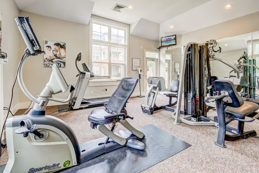Well-equipped fitness center with cardio equipment at Heather Park Apartment Homes in Garner, North Carolina