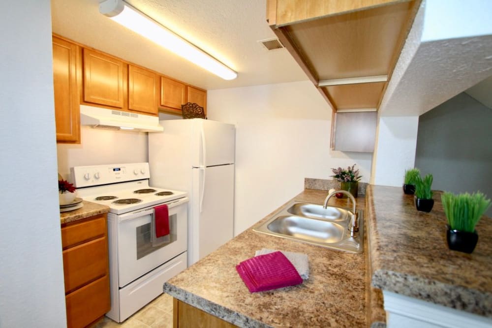 a kitchen with ample appliances at Royal Pointe in Virginia Beach, Virginia