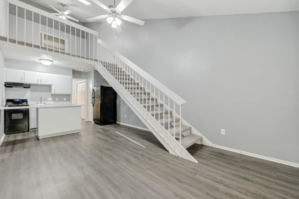 Living area and stairs at Lofts at Pecan Ridge in Midlothian, Texas