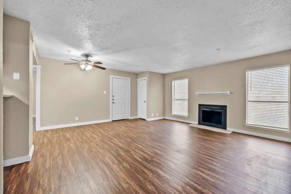 living room area at Stonegate Apartments in Mckinney, Texas
