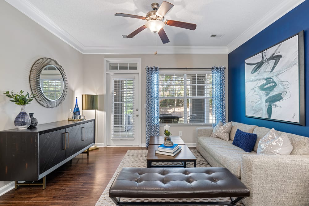 Living area with ceiling fan at The Preserve at Ballantyne Commons in Charlotte, North Carolina